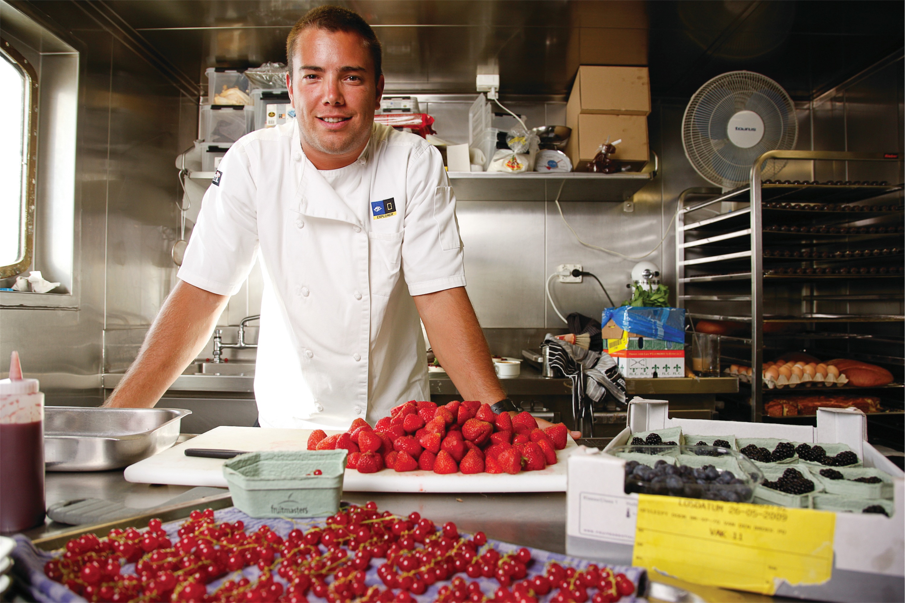 Lindblad Expeditions National Geographic Explorer Interior Kitchen Staff.jpg